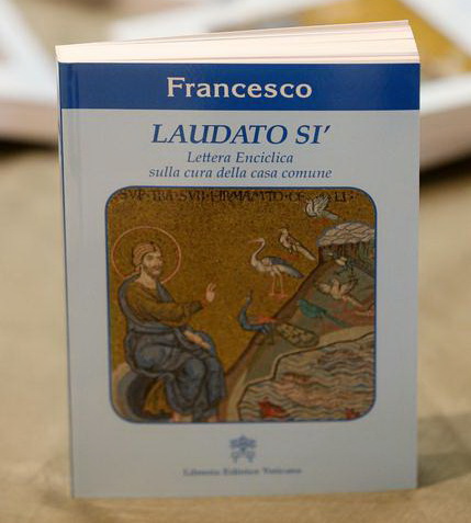 Copies of Pope Francis's encyclical, a collection of principles to guide Catholic teaching, entitled "Laudato Si " lies on a table during its official presentation at the Sinod hall in the Vatican, 18 June 2015.   ANSA/ALESSANDRO DI MEO